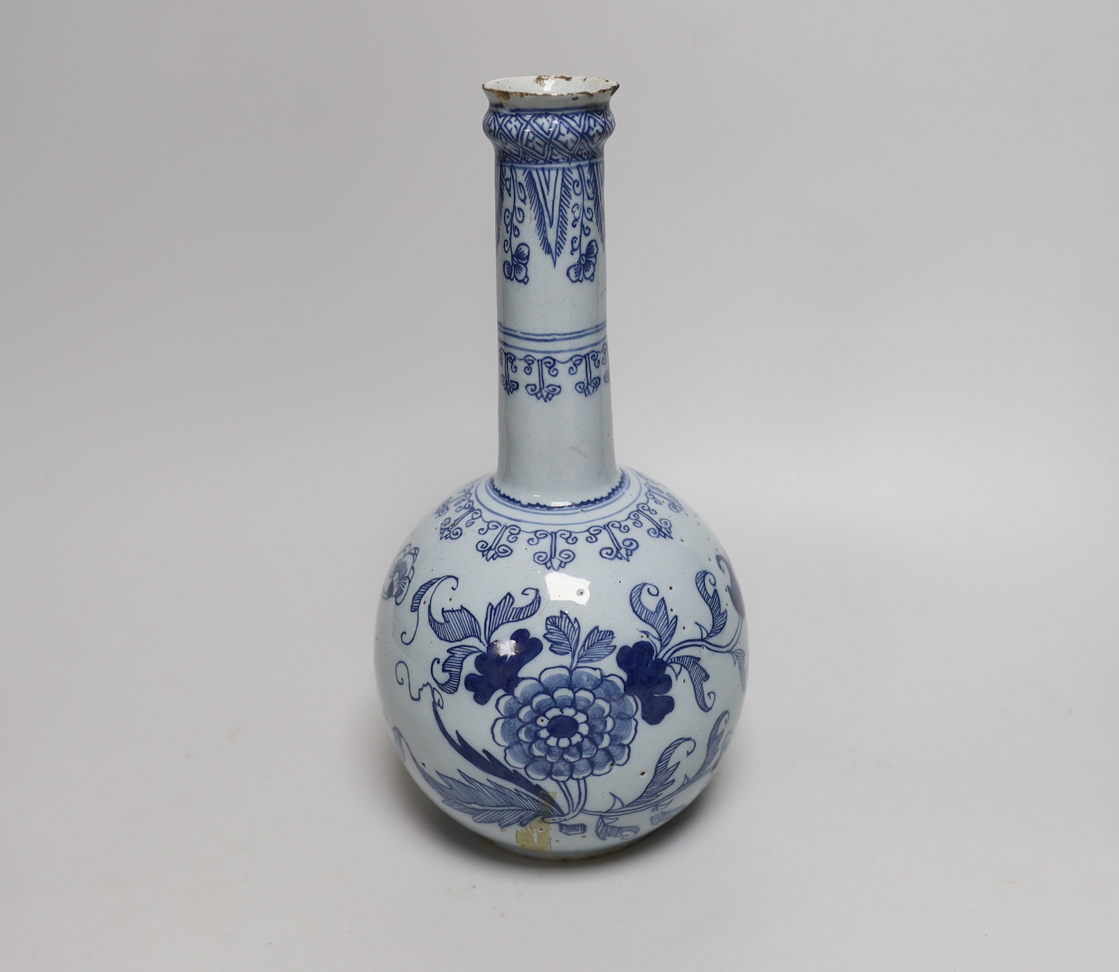 A mid 18th century English delftware chinoiserie bottle vase (guglet), 27cm high